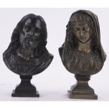 A pair of patinated busts of Christ and Mary circa 1900, unsigned, height 16cm.