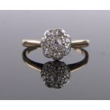 An 18ct diamond cluster ring, setting width 8mm, size O.