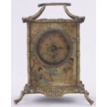 A chinoiserie brass simulated bamboo framed mantel clock circa 1900, height 21cm.