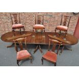 A large mahogany 3-section pedestal dining table, comprising 2 D-ends,