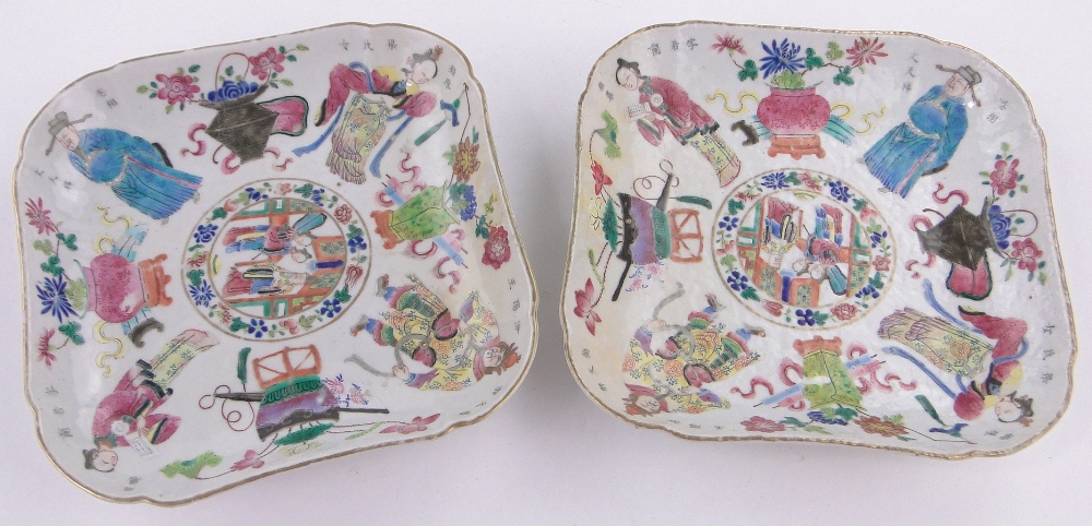 Pair of 19th century square porcelain dishes, with painted enamelled figures and text, width 23.