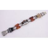 A Victorian Scottish agate and silver 5 panel bracelet.