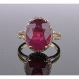 A 14ct gold ruby and diamond cluster ring, ruby approx. 7cts, diamond content approx. 0.