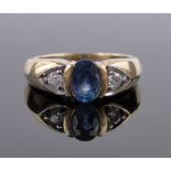 A 9ct gold 3 stone sapphire and diamond ring, sapphire height 7mm, size N.