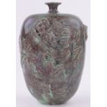 A Chinese green/brown mottled glazed porcelain vase, with relief dragon design, height 28cm.