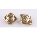 Pair of Chanel gilt metal monogram earclips, height 25mm.