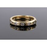 An 18ct gold 5 stone diamond band ring, size K, 4.5g.
