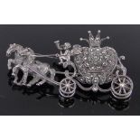 A silver and marcasite Fairy Tale carriage design brooch watch, length 65mm.