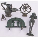 A group of Indian and Oriental bronzes, (5).