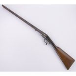 An Antique double barrel shotgun for ornamental use, percussion action removed.