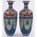 Pair of Chinese Cloisonne enamelled vases, height 37cm.