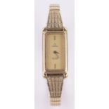 A lady's Omega DeVille gold plated quartz wristwatch, case width 14mm.