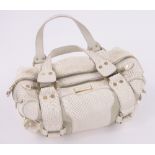 A Jimmy Choo white snakeskin designer handbag.