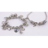 A Pandora silver charm bracelet, and another silver charm bracelet, (2).