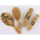 A 4-piece French ivory backed brush and mirror set circa 1900,