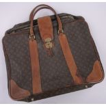 A Vintage Louis Vuitton monogram leather mounted suitcase, width 65cm.