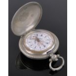 A continental white metal cased full hunter pocket watch, with enamelled dial,