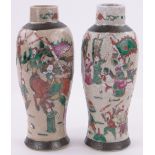 Pair of Chinese porcelain vases, with enamelled Warriors, height 29cm.