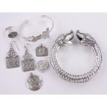 A group of ethnic silver jewellery.