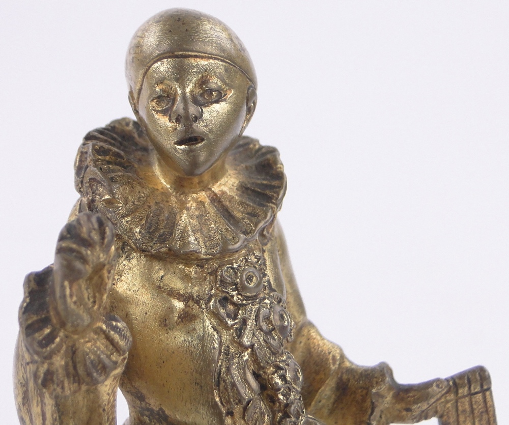 A French gilt bronze Pierrot clown, early 20th century, unsigned on rouge marble plinth, - Bild 3 aus 3