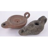 2 Ancient Roman/Greek terracotta oil lamps.