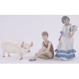 A Copenhagen porcelain dancer, a Lladro Flamenco dancer and a Beswick Champion Sow "Wall Queen",