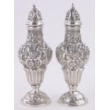 A pair of continental silver sugar casters, possibly Colonial,