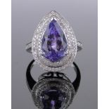 A 14ct white gold pear cut tanzanite and diamond cluster ring, tanzanite approx. 5.