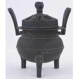 A Chinese bronze censer, overall height 18cm, diameter 13cm.