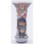 An Oriental Arita porcelain vase, of octagonal form with painted and gilded designs, height 27cm.