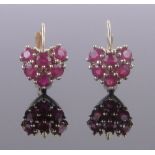 Pair of 9ct gold ruby set heart earrings, height 9mm.