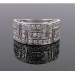 An 18ct white gold diamond set Greek key design band ring, total diamond content approx. 1-1.