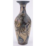 A Victorian Doulton Lambeth vase by Edith Lupton, relief moulded floral and geometric designs,