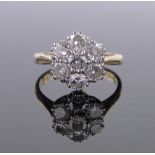 An 18ct diamond cluster ring, total diamond content approx. 1.4cts, colour approx.