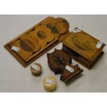 A Mauchline Ware letter rack, a box and a Black Forest pocket watch holder, etc.