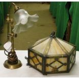 A Vintage brass desk lamp and a hexagonal Tiffany style lamp shade.