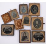 A group of Victorian Dageurrotype & silver print portrait photographs, in leather frames (8)