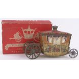 A Jacob's Biscuits novelty Coronation coach design biscuit tin, length 9",