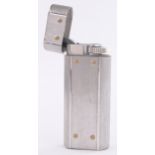 A Cartier silver pocket lighter, height 2.25"