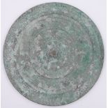 A large Chinese tinned bronze mirror, Western Han dynasty 206 BC - AD 8, depicting a rare