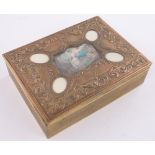 A French gilded copper jewel box, the lid having a miniature inset watercolour on ivory depicting