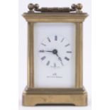 A Miniature Swiss made brass cased carriage clock, dial marked Matthew Norman, height excluding