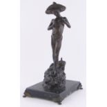 A patinated bronze fisherboy, on marble plinth base, unsigned, height 43cm.