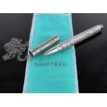 A Tiffany & Co sterling silver ballpoint pen, on silver chain, original box & case