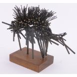 A Modernist patinated bronze abstract sculpture, with inset quartz specimens on stained wood base,