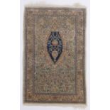 A small Persian woven silk prayer rug, 70cm x 45cm.