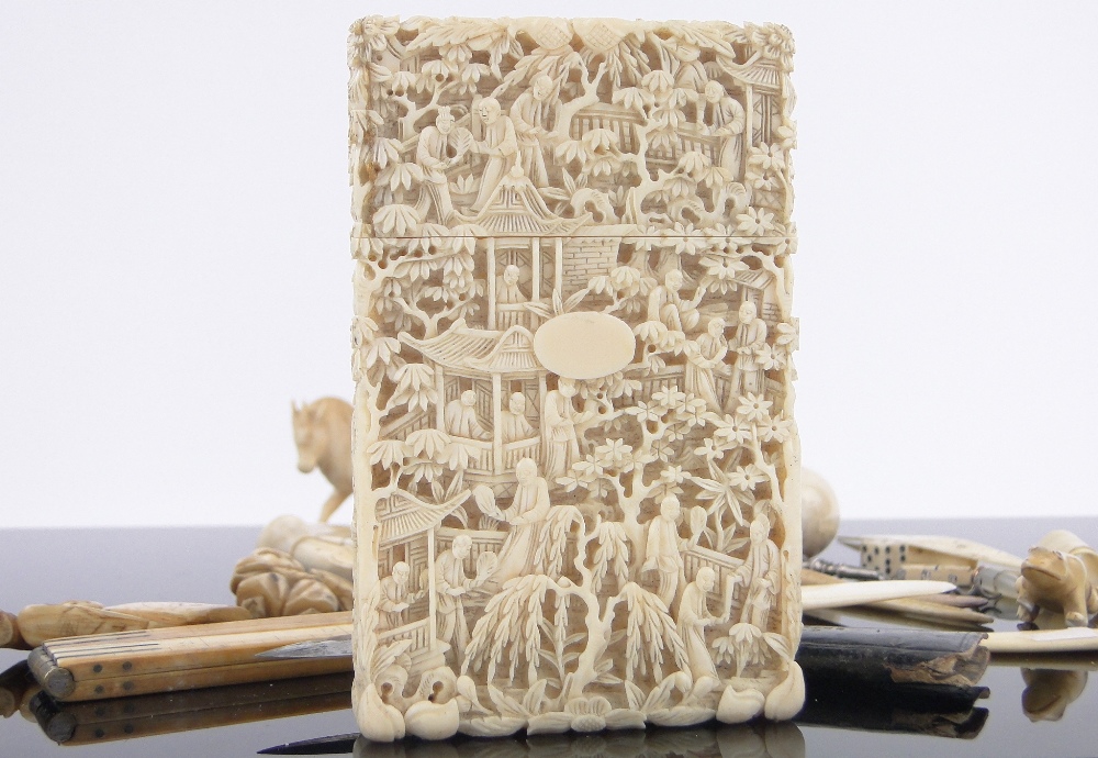 A 19th century Chinese relief carved ivory card case, lid repaired, height 10. - Image 2 of 3