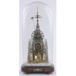 A Victorian brass skeleton clock in the form of the Walter Scott Memorial Tower in Edinburgh,