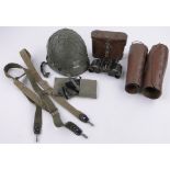 Group of Second World War German Military items, including Afrika Korps goggles, helmet, Puttees,