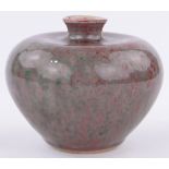 A Chinese mottled red/green glazed shouldered vase, diameter 11cm, height 8.5cm.